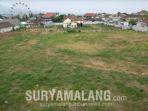 lahan-di-kawasan-rumah-tua-yang-rencananya-disewa-lahan-parkir-di-sekitar-alun-alun-kota-batu.jpg