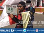meidi-bastoni-42-melakukan-jalan-mundur-dari-alun-alun-tulungagung-menuju-puncak-gunung-wilis_20180814_165839.jpg