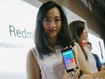 model-menunjukkan-xiaomi-redmi-5a-dalam-acara-peluncuran-di-jakarta_20171221_191941.jpg