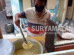 penjual-gulai-kacang-hijau-di-kampung-boto-putih-surabaya.jpg