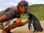 persahabatan-antara-manusia-dengan-penguin.jpg