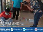 polisi-olah-tkp-pencurian-di-kantor-desa-plosokandang.jpg