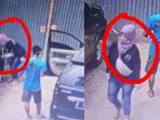 pria-dan-wanita-membuang-bungkusan-merah-berisi-jasad-bayi-terekam-cctv.jpg