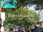 rambu-yang-tertutup-dahan-pohon-di-kepanjen-kabupaten-malang_20180227_173444.jpg