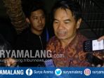 sekda-kota-malang-wasto-usai-menjalani-pemeriksaan-penyidik-kpk-di-polres-malang-kota_20170814_201135.jpg