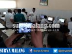 sutiaji-wawali-kota-malang-saat-di-ruang-unbk-siswa-smp-nu-hasyim-asyhari-di-smkn-4_20170503_120436.jpg