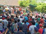 tradisi-perayaan-maulid-nabi-tebar-koin-di-madiun.jpg