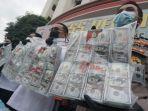 uang-dolar-palsu.jpg
