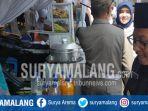 wali-kota-malang-sutiaji-meninjau-bazar-pasar-rakyat-setelah-meresmikan-e-retribusi-di-pasar-besar.jpg