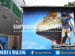 warga-melukis-rumah-di-sentra-industri-tempe-sanan-kota-malang_20170204_174612.jpg