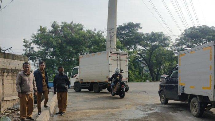 Kendaraan Sudah Leluasa Melintas di Jalan Sangego Karawaci setelah Jalan Ambles Diperbaiki
