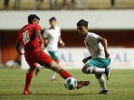 Aksi-pemain-Timnas-Indonesia-U-16-saat-berhadapan-dengan-Singapura-U-16-di-Piala-AFF-U-16-2022.jpg