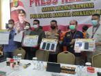 Konfrensi-pembuat-surat-hasil-tes-antigen-palsu-yang-terkoneksi-ke-Aplikasi-PeduliLindungi.jpg