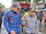 Pj-Wali-Kota-Tangerang-Dr-Nurdin-tinjau-TPS-Banjir.jpg