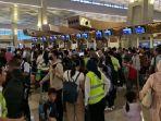 antrean-di-konter-check-in-Garuda.jpg
