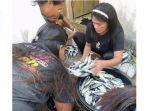Bagi-bagi-ikan-gratis-oleh-DKP-Pulau-Morotai-sebagai-wujud-program-tekan-Inflasi-dan-Stunting.jpg