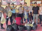 Barang-bukti-miras-jenis-cap-tikus-dan-pemiliknya-diamankan-Polsek-Ternate-Selatan.jpg
