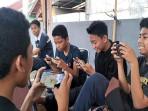 Ilustrasi-game-gim-online-mobile-legend-free-fire-kode-redeem.jpg