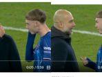Pelatih-Manchester-City-Pep-Guardiola-mengobrol-dengan-bintang-Chelsea-Cole-Palmer.jpg