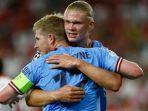 Pemain-Manchester-City-Erling-Haaland-berpelukan-dengan-Kevin-De-Bruyne.jpg