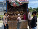 Polres-Oba-Utara-Amankan-pelaku-dan-barang-bukti-kayu-yang-diduga-ilegal.jpg