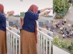 viral-wanita-bagi-bagi-uang-dari-balkon.jpg