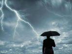 ilustrasi-cuaca-buruk-payung.jpg
