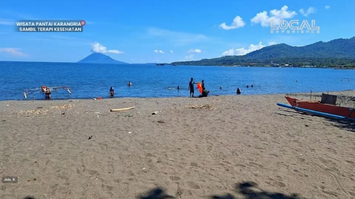 Pesona Pantai Karangria di Manado, Sulawesi Utara untuk liburan akhir tahun.