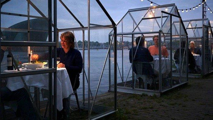 Minimalisir COVID-19, Restoran di Amsterdam Ini Buat Rumah Kaca Kecil untuk Pelanggan