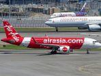 Ilustrasi-Pesawat-AirAsia-Berhad-Malaysia.jpg