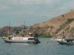 Ilustrasi-kapal-pinisi-berlayar-di-Pulau-Komodo-Labuan-Bajo-Nusa-Tenggara-Timur-NTT.jpg