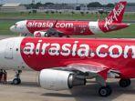 Ilustrasi-pesawat-AirAsia-dengan-rute-Jakarta-Manado.jpg