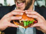 Ilustrasi-pria-makan-burger.jpg