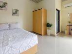 Kamar-penginapan-di-hotel-murah-AroeL-Homestay-Mitra-Reddoorz-Jambi.jpg