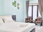 Kamar-penginapan-di-hotel-murah-Homestay-Dalimo-2-Syariah-RedPartner.jpg