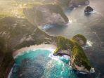 Pemandangan-ikonik-Kelingking-Beach-di-Nusa-Penida-Bali-dengan-tebing-T-Rex-dan-laut-biru-jernih.jpg