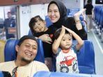 Penumpang-naik-kereta-api-saat-libur-sekolah.jpg