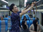 Penumpang-naik-kereta-api-selama-libur-sekolah-berlangsung.jpg