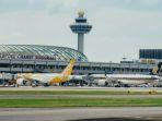 Pesawat-mendarat-di-Bandara-Internasional-Changi-Singapura.jpg