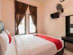 RedDoorz-Syariah-DOstha-Residence.jpg