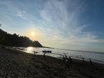 Serunya Menikmati Panorama Sunset di Pantai Mangatasik Minahasa Sulut