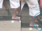 aksi-penjual-jajanan-cuci-wajan-di-genangan-air-viral-pedagang-jorok-ini-buat-warganet-merinding.jpg