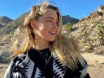 amber-heard-jet-pribadi.jpg