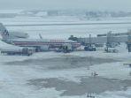 badai-salju-melanda-bandara.jpg