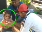 bayi-yang-ditemukan-di-parit-pasca-gempa-dan-tsunami-di-palu_20181001_212415.jpg