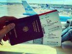 boarding-pass-dan-paspor-liburan.jpg