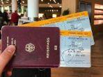 boarding-pass-pesawat-dan-paspor.jpg
