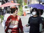 geisha-berjalan-di-jalanan-kyoto.jpg