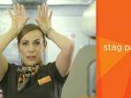 ilustrasi-isyarat-tangan-pramugari-easyjet.jpg