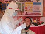 ilustrasi-penumpang-yang-melakukan-rapid-test-antigen.jpg